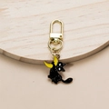 Close-up of black cat pendant holding yellow moon on metal keychain with lobster clasp - Yellow Moon-Small