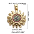 Detailed macro view of gold-plated sunburst pendant with red, green, and blue zircon - CX164-3 (Multicolor Gemstone Sunburst Gold Pendant)