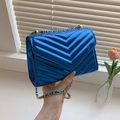 Chic blue quilted patent leather square bag with gold metal chain strap and V-pattern - Blue