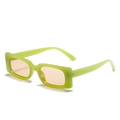 Retro rectangular sunglasses with a neon green frame and light orange tinted lenses - Green Frame Light Tea Lens