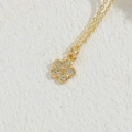 Elegant gold flower pendant necklace with shimmering zircon stones and minimalist design - Flower Style (XL2433) / Gold