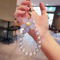 Light blue beaded phone wrist strap with macaron flower charm and translucent round beads - Blue Flower Blue Beads