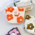 Plush floral mini pouch in three colors featuring soft faux rabbit fur and label - Orange Flower
