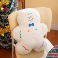 White gingerbread man plush toy with colorful embroidery on a cozy chair - Coconut Gingerbread Man / 45cm