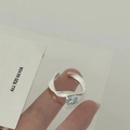Silver open ring with twisted band and light blue round zircon on model finger - Silver Twist Light Blue Round Gemstone Open Ring (J5950)