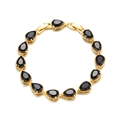 Detailed view of a gold bracelet featuring teardrop-cut black stones on white background - 24K Gold Plated Black