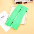 Neon green knitted arm warmers, long fingerless sleeves for outdoor sun protection. - One Size / Green