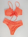 Detailed flat lay of a coral orange halter bikini set with ring detail and side pleats - Orange