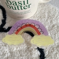 Detail of a colorful acrylic hair claw clip in a rainbow and yellow cloud design shape - 9.7cm / Yellow Cloud