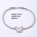 Détail du bracelet tennis papillon serti de zircons CZ, finition argent, longueur 19,5 cm - Argent (Zirconium Blanc & Coquille)