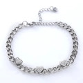 Elegant silver heart bracelet with sparkling stones on a classic cuban chain design - Steel