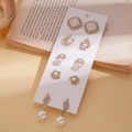 Set of five gold alloy earrings with pearls and rhinestones on a decorative book - 5 Pairs Set / Gold (Set of 10)