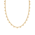 Macro-opname van goudkleurige titanium ketting met kleine ronde kralen en fijne schakels - Goud