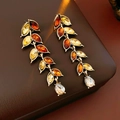 Detail of vintage bronze wheat leaf earrings with amber rhinestones and crystal tassel - Silver Needle Leaf Earrings Amber Brown Green