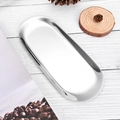 Polished silver stainless steel oval tray on white wooden background with pinecones - Silver Tray 23*9.5cm