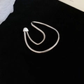 Detailed view of silver irregular twisted double hoop ear cuff with teardrop accent - Silver (Single)