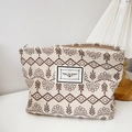 Beige corduroy floral cosmetic bag with brown embroidery and secure zipper closure - Beige Plants