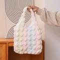 Macro view of pastel gradient puff tote bag with quilted wavy texture and handles - No. 2 (Macaron Four-color Gradient)