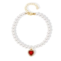 Elegante Haustier-Perlenkette mit leuchtend rotem Herz-Edelstein-Anhänger in Gold - Rot