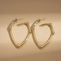 Boucles d'oreilles créoles cœur dorées avec texture bambou et pierres serties - Doré