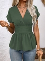 Detail of V-neck dark green top with pleated waist and ruffled hemline textures - S / Green