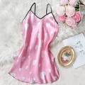 Pink satin nightgown with heart print and V-neckline shown in a stylish home setting - Pink With White Heart