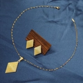 Detailed view of golden rhombus necklace and earring set with fine metallic textures - E6107-12/Gold Rhombus Texture