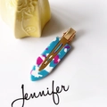 Detailed macro view of an artistic acetate hair clip with blue and pink marbled patterns - 32# 7cm Blue Pink White Patchwork