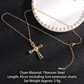 Gold titanium cross necklace featuring colorful zirconia stones on a black background - Cross No.9 Gold (A297)