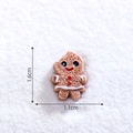 Miniature resin gingerbread man ornament with white icing details and size dimensions - 18# Small Gingerbread Man (Dark)