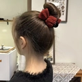 Elegant red knitted bow hair claw clip for bun hairstyles with a cozy autumn winter aesthetic - Burgundy