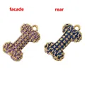 Bone-shaped heart pendant with purple and blue crystals in gold setting, front and rear view - Gold Purple/Blue Zircon Bone