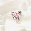 Pink gemstone planet earring with silver finish and zircon stones on white fabric - Pink
