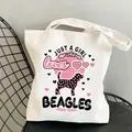 White canvas tote bag featuring a colorful Just a Girl Who Loves Beagles print - C24 Just a Girl who loves Beagles