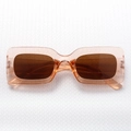 Modern rectangular sunglasses in translucent peach pink with dark brown protective lenses - Champagne Tea