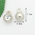 Silver alloy moon pendant with clear crystal inlay showing front and back views - White Zirconia Silver