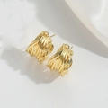 Detailed macro shot of 14K gold-plated multilayer spiral wire stud earrings for women - Multi-layer Spiral Studs / Gold
