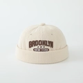 Detailed texture of beige corduroy docker hat with Brooklyn New York star embroidery - 52cm (2-5 Years) / Brooklyn Letter - Cream White