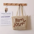 Beige woven crochet tote bag with brown embroidered bon jour lettering on front - Beige + Coffee