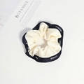 French style scrunchie with CHANGE lettering and contrast black and white silk texture - White
