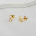 Elegant gold heart zirconia stud earrings with butterfly shape on stone background - Heart Bow (E0026) / Gold