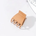 Matte brown plastic hair claw clip for high ponytail on white background - Plastic / Brown