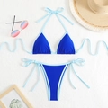 Royal blue bikini set with light blue trim, halter top and side-tie bottoms on plush base - Royal Blue