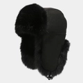 Side view of black winter trapper hat featuring thick faux fur lining and suede finish - One Size / Black