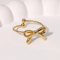 Anillo de acero inoxidable chapado en oro con lazo y diseño abierto ajustable - Dorado
