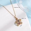 Gold-plated sea turtle necklace with colorful zircon inlay on a white background - Mixed Color