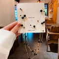 Chaîne de corps élégante multicouche en or avec perles noires facettées sur carte - Collier-Noir