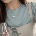 Elegant silver butterfly pendant necklace for women shown on neck for daily wear - Korean Style Fresh Bowknot Pendant (XL3233)