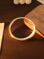 Minimalist polished golden CCB open bangle bracelet with a high-shine metallic finish - L156-1 Gold Flat Oval
