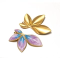 Golden and gradient blue-pink enamel leaf-shaped butterfly charms on white background - Gradient Purple Leaf